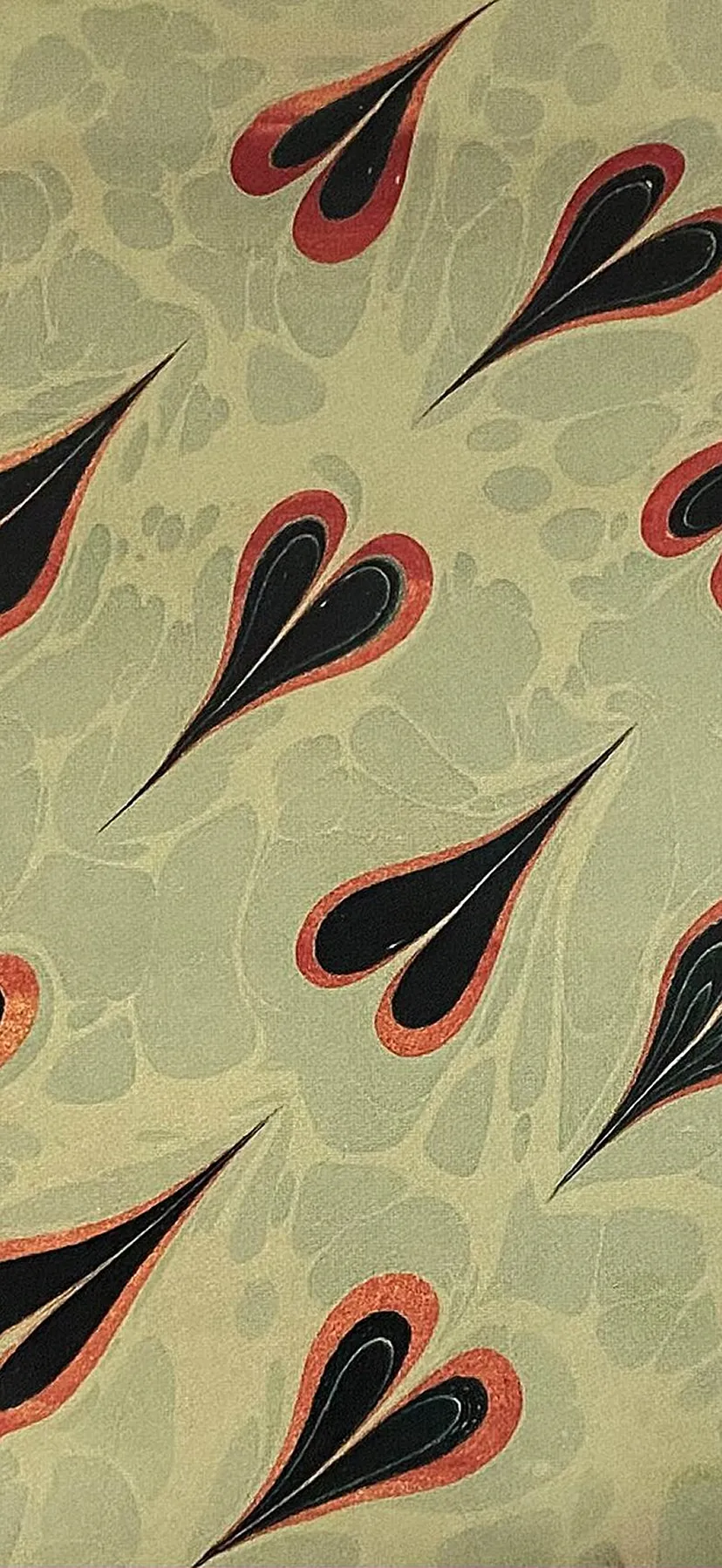 Traditional Turkish Ebru: drawn tulip on a stone ground